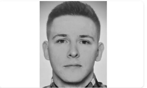 Wizerunek poległego policjanta.